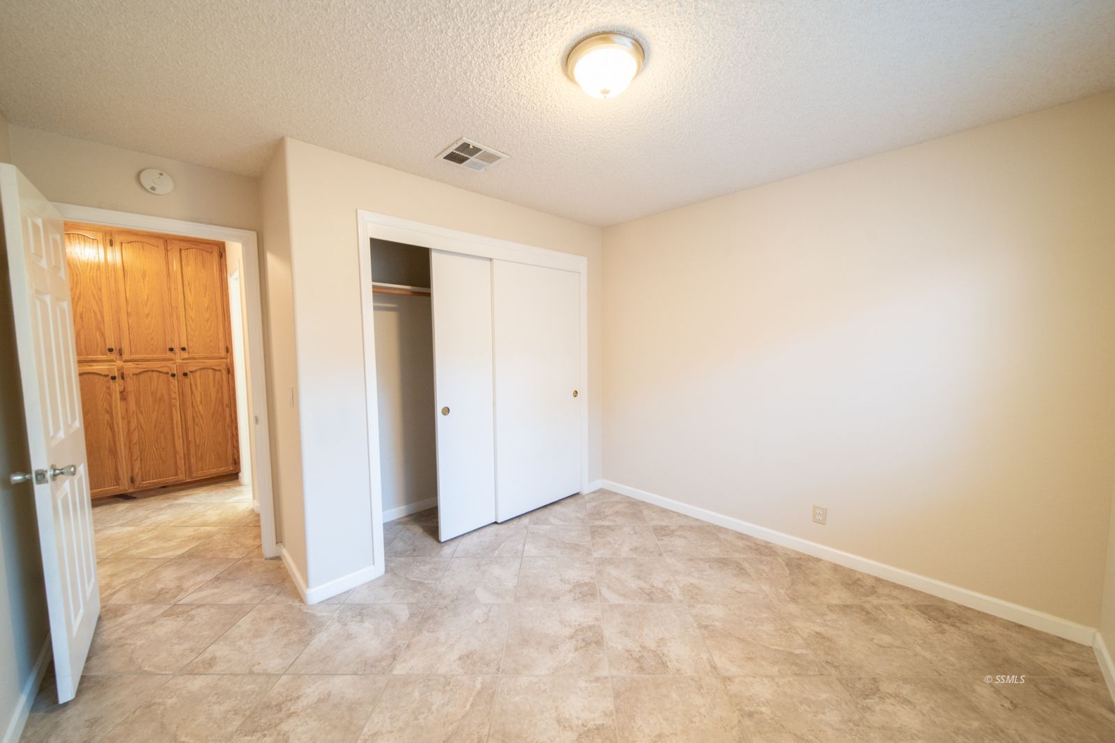 1205 Flora Way Ridgecrest, CA 93555 - Photo 31 of 46 an empty room with a natural light