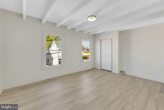 an empty room with windows