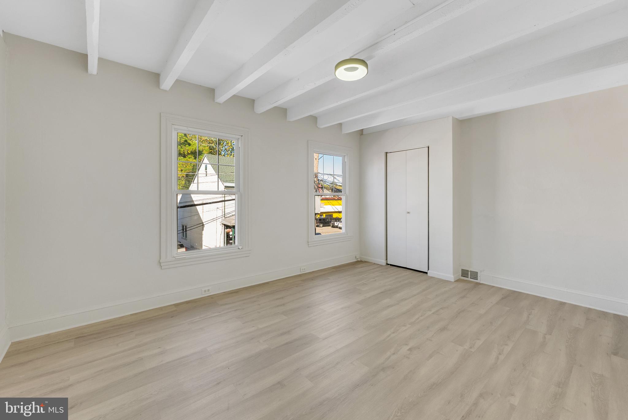 8 Church Street, Unit B Mount Holly, NJ 08060 - Photo 7 of 15 an empty room with windows