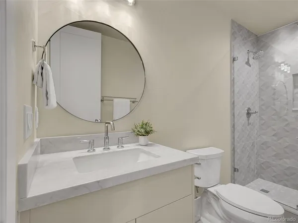 a bathroom with a sink double vanity and a mirror