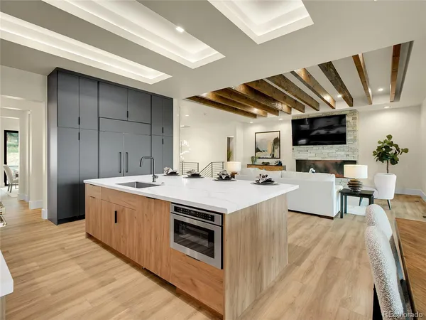 a stove top oven sitting inside of a kitchen
