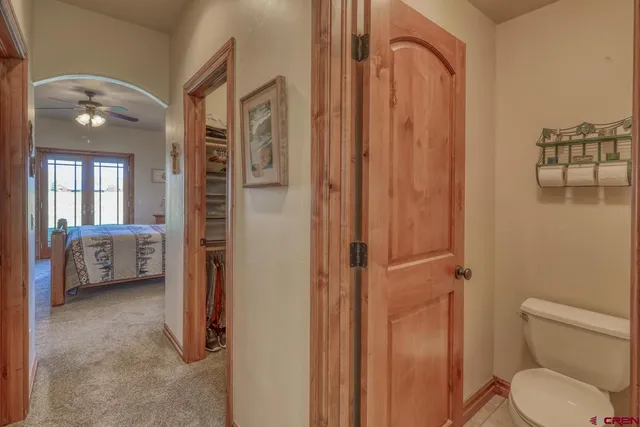 a en suite bathroom with a toilet a sink and shower