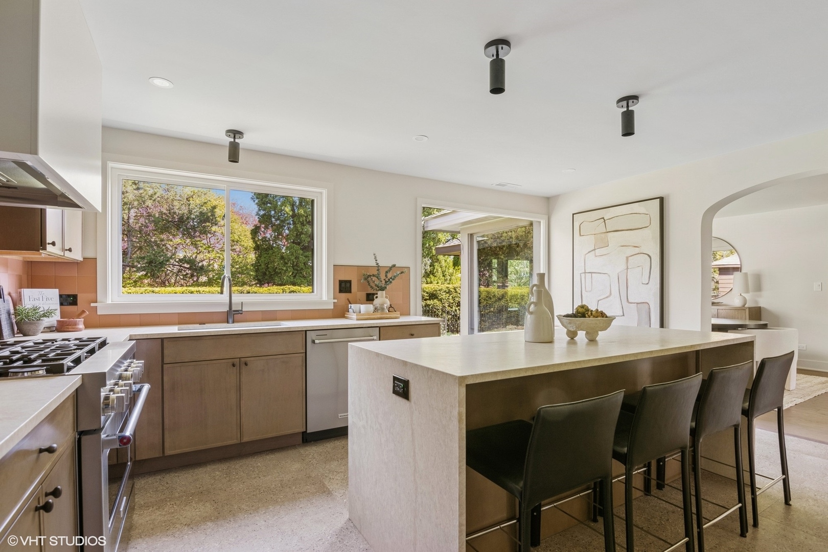 148 Geneva Road Glen Ellyn, IL 60137 - Photo 13 of 45 a kitchen with a sink stove and microwave