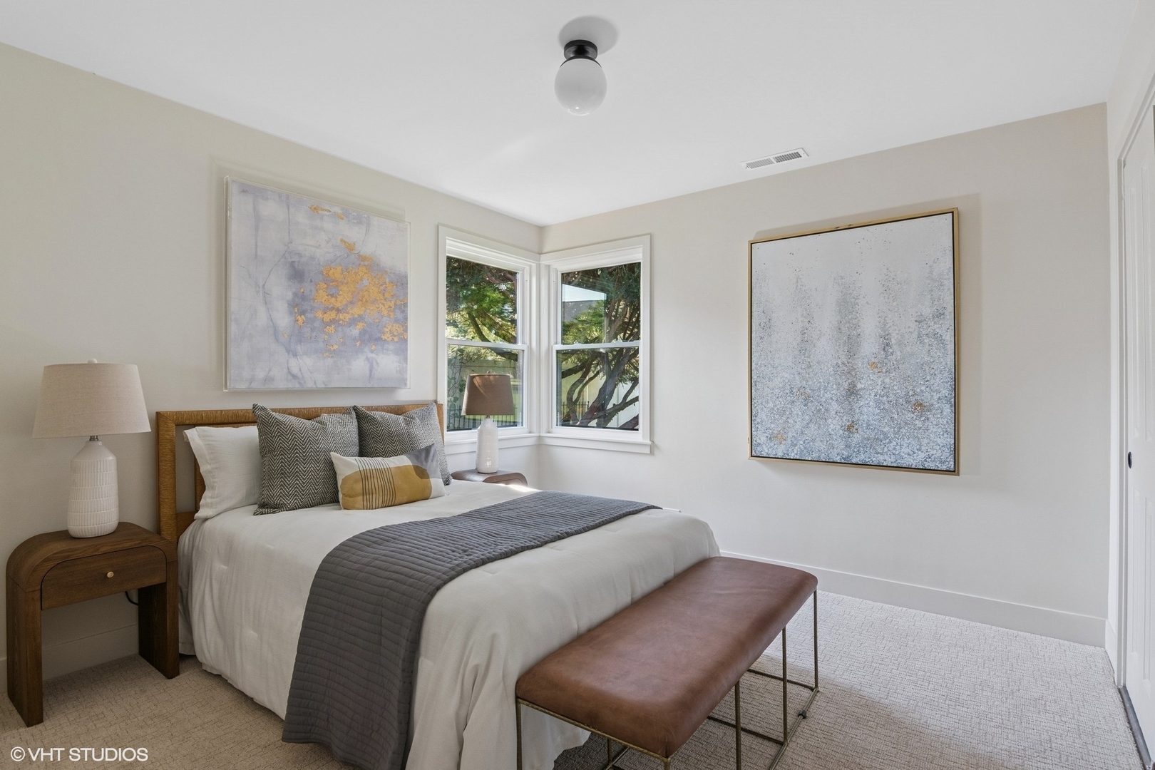 148 Geneva Road Glen Ellyn, IL 60137 - Photo 23 of 45 a bedroom with a bed and a painting on the wall