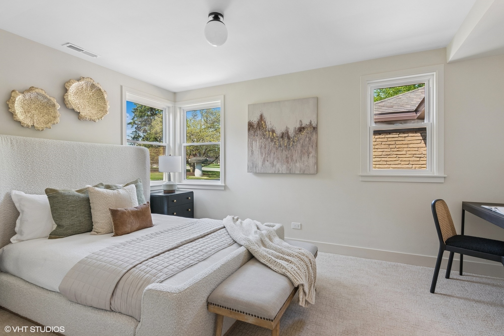 148 Geneva Road Glen Ellyn, IL 60137 - Photo 27 of 45 a bedroom with a bed and a chair