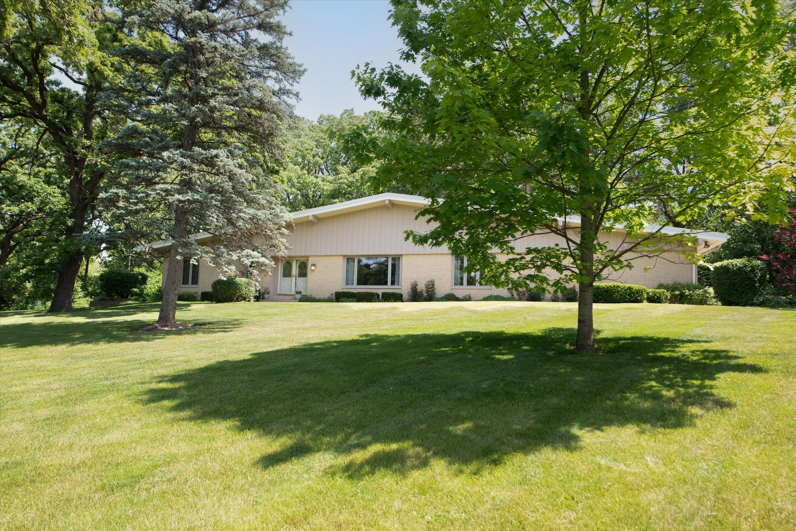 1196 Nottingham Lane Elgin, IL 60120 - Photo 1 of 45 a front view of a house with a yard
