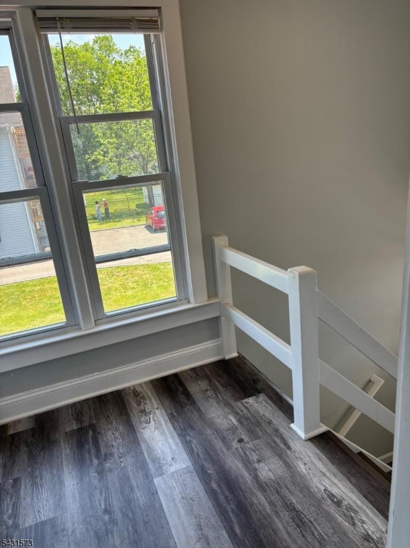 358 Woodland Road, Unit 2 Madison, NJ 07940 - Photo 35 of 50 a view of a room with wooden floors and window