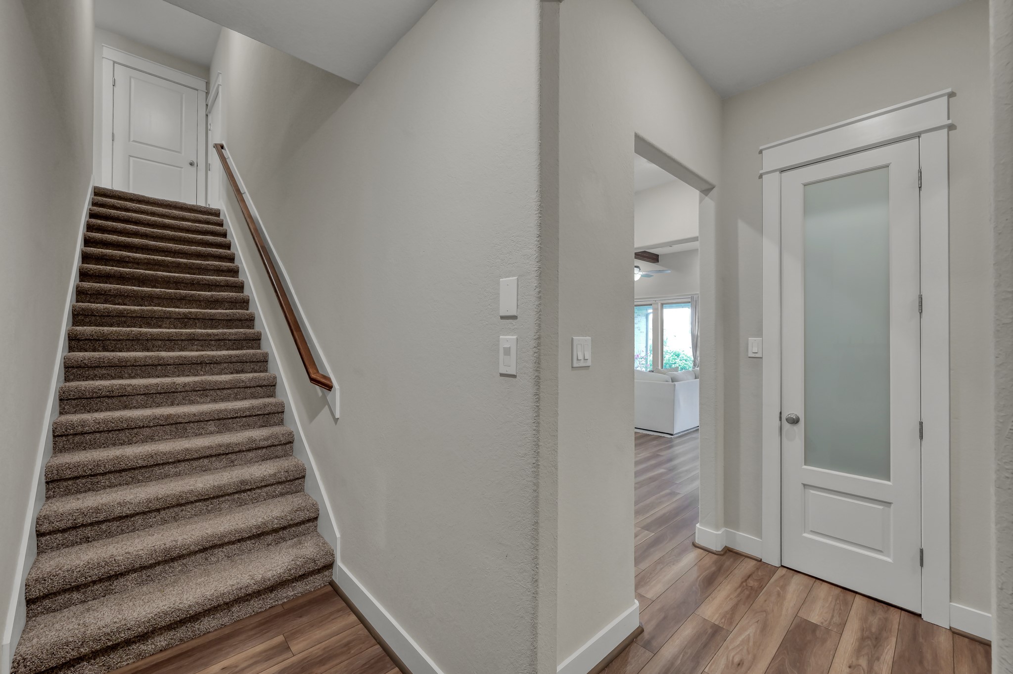 12469 Pebble View Drive Conroe, TX 77304 - Photo 28 of 41 Stairway to another bedroom, full bathroom, game room, and balcony.