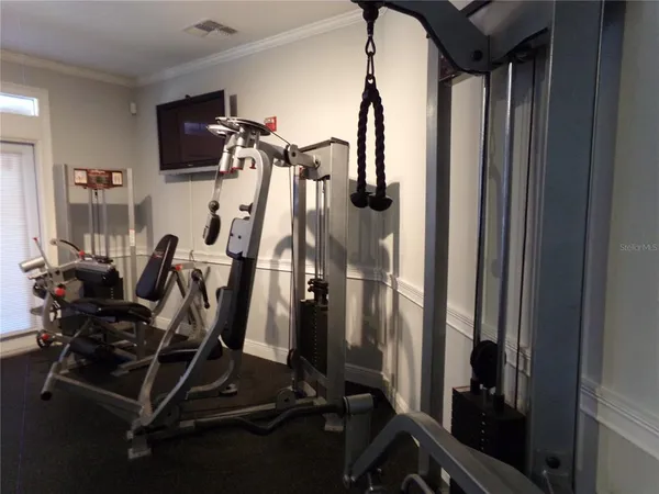 a view of a room with gym equipment