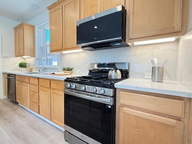 9639 Camassia Way San Ramon, CA 94582 - Photo 14 of 67 a kitchen with stainless steel appliances granite countertop a sink and a stove