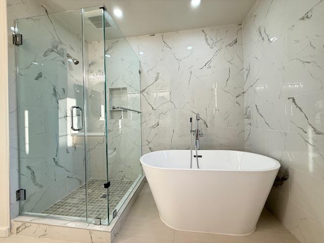 9639 Camassia Way San Ramon, CA 94582 - Photo 37 of 67 a white bath tub sitting next to a shower