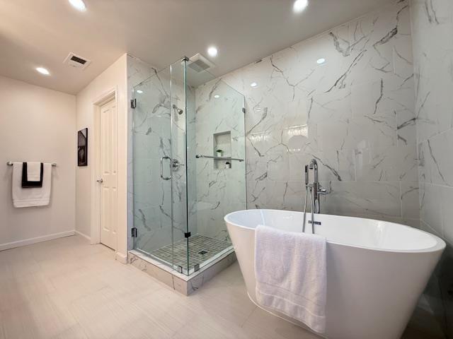 9639 Camassia Way San Ramon, CA 94582 - Photo 39 of 67 a bathroom with a bathtub and shower