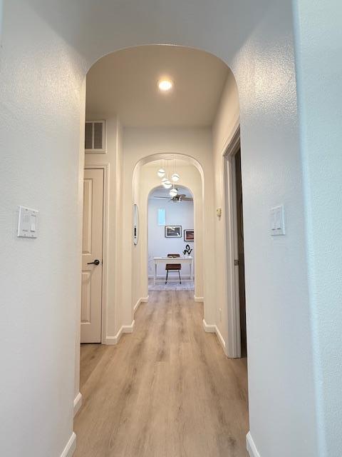 9639 Camassia Way San Ramon, CA 94582 - Photo 4 of 67 a view of a hallway view with wooden floor and living room