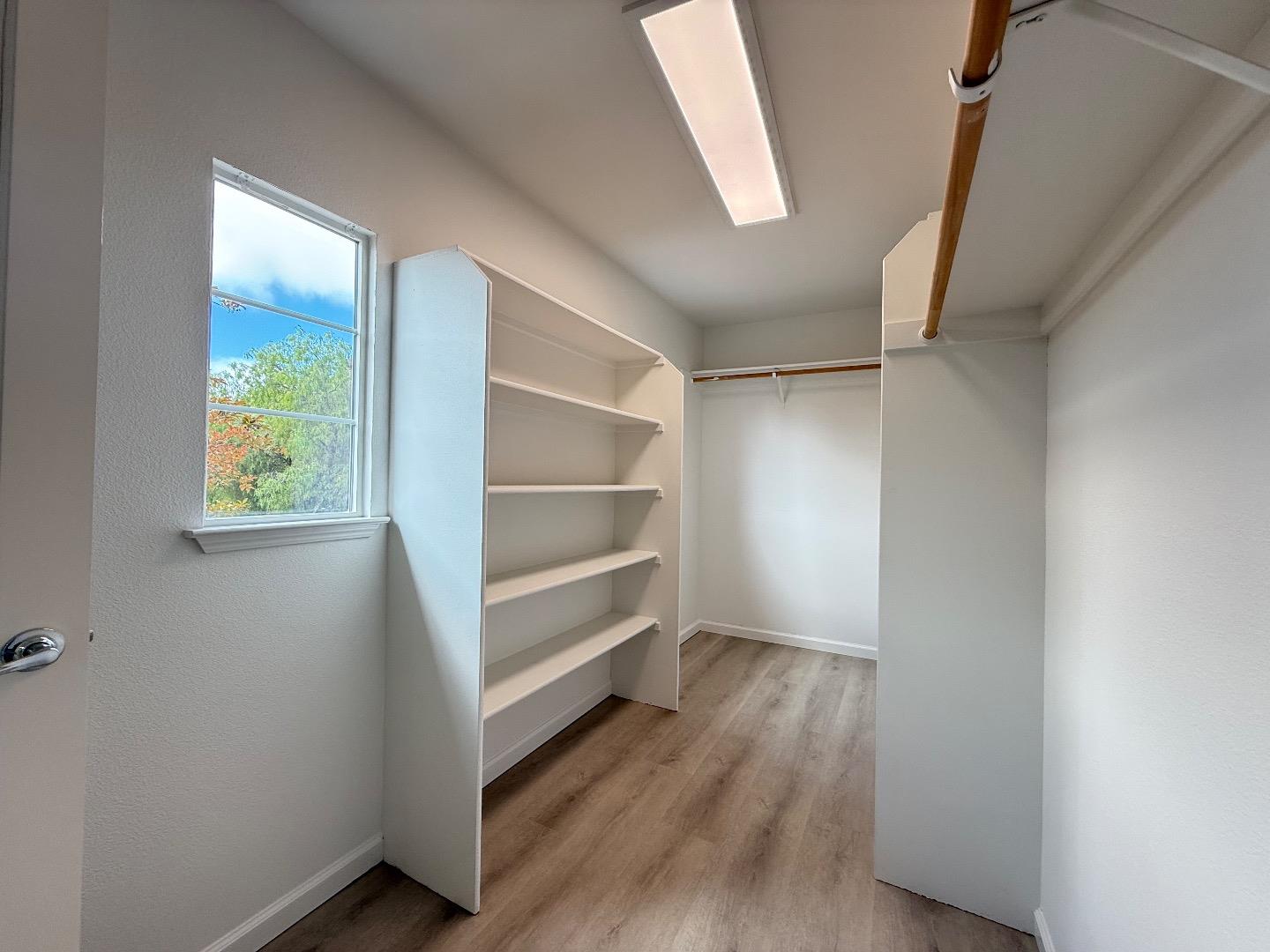 9639 Camassia Way San Ramon, CA 94582 - Photo 43 of 67 a view of walk in closet with empty racks