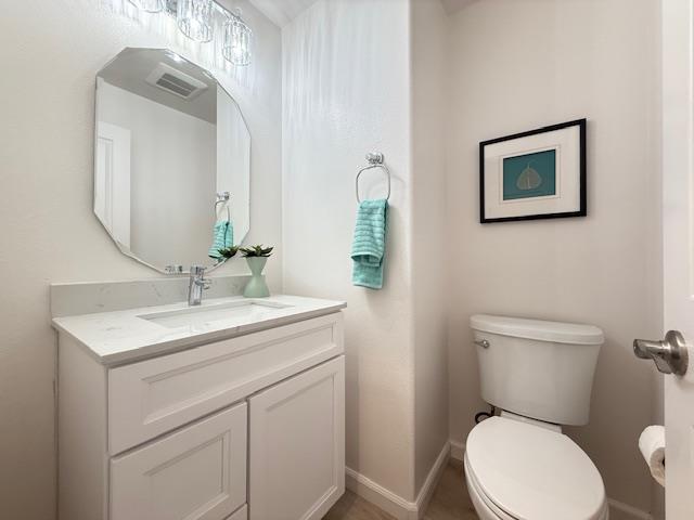 9639 Camassia Way San Ramon, CA 94582 - Photo 5 of 67 a bathroom with a toilet sink and mirror