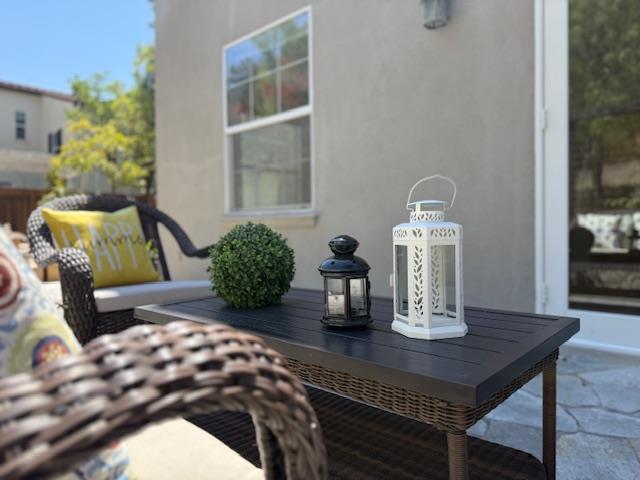 9639 Camassia Way San Ramon, CA 94582 - Photo 62 of 67 a bedroom with a bed and chandelier