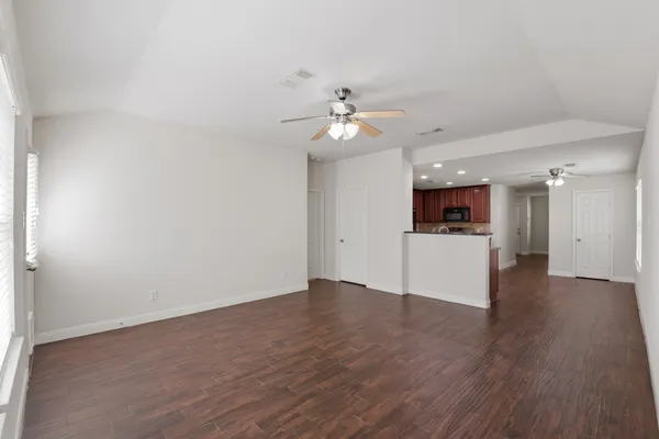 a view of a kitchen with a sink and a microwave