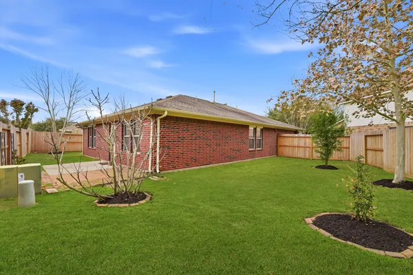 a view of a backyard with a garden