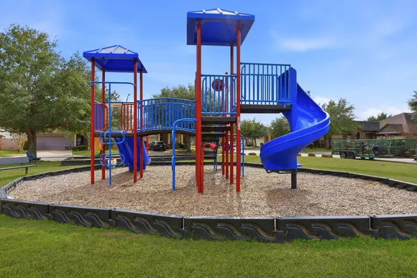 a view of yard with grass and a trees