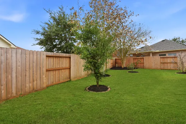 a childrens park with lots of swings and slides