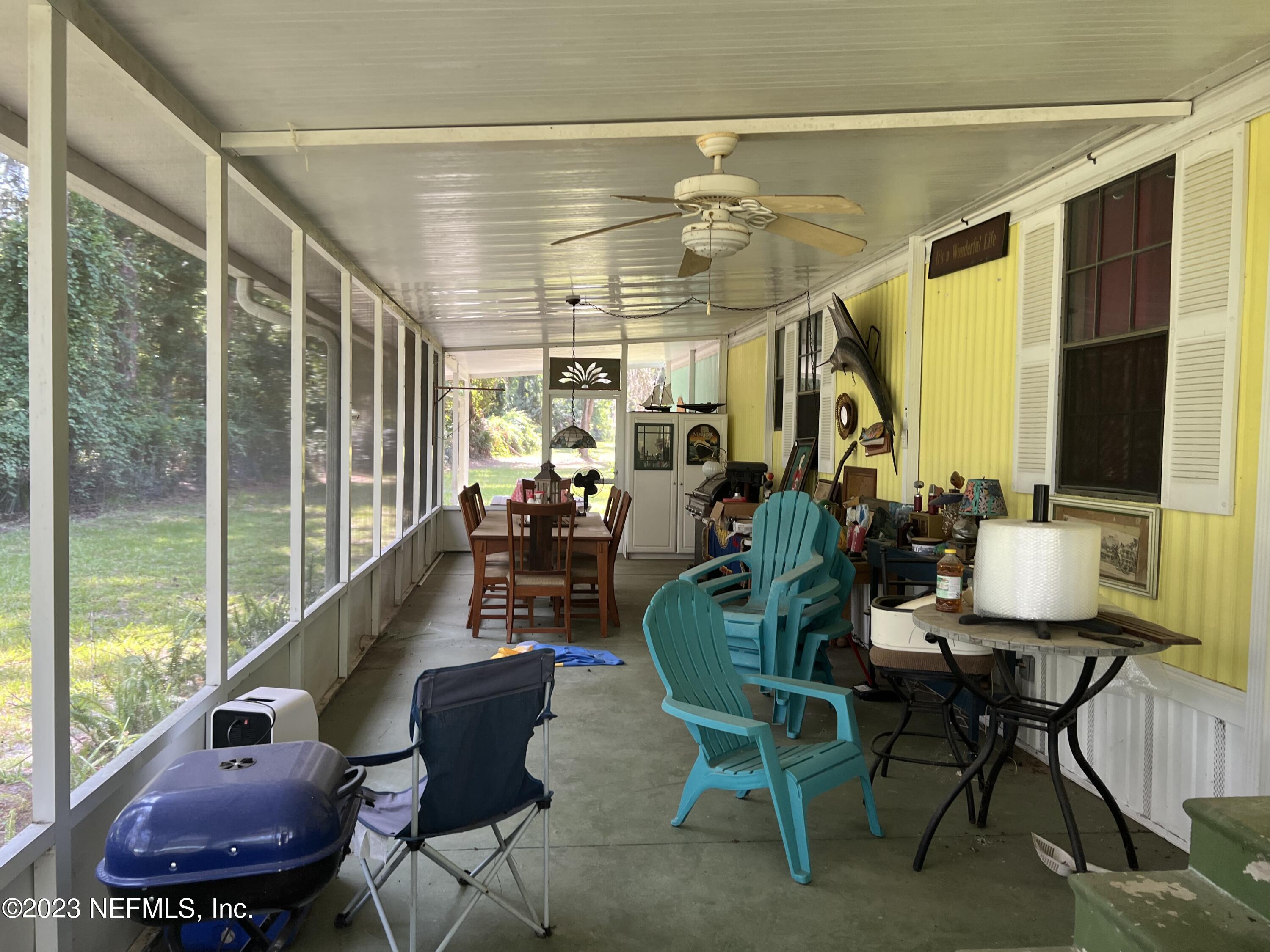 116 Parker Road Crescent City, FL 32112 - Photo 3 of 17 screened porch