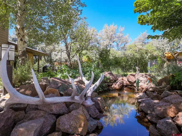 a view of outdoor sitting area with furniture