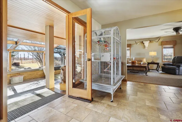 a view of a entryway door with living room