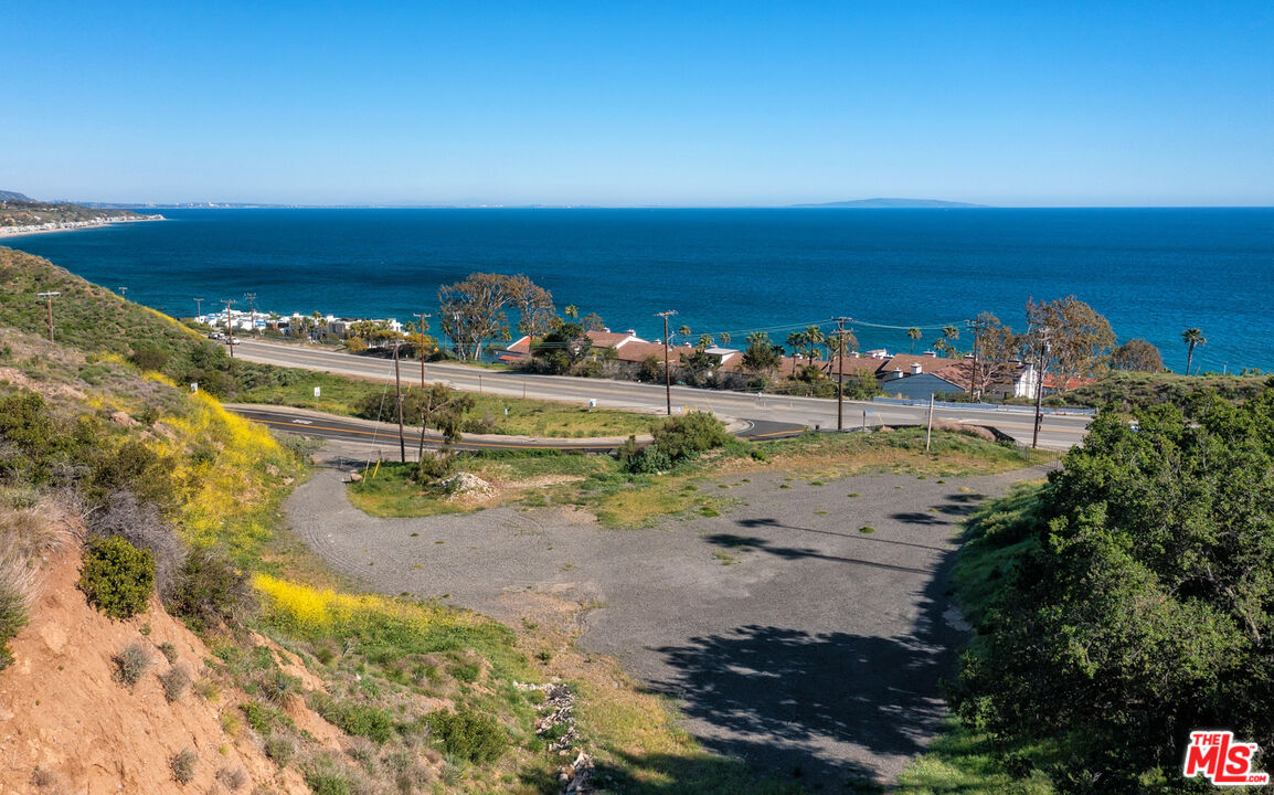 6445 Latigo Canyon Road Malibu, CA 90265 - Photo 2 of 5 a view of a lake with a city