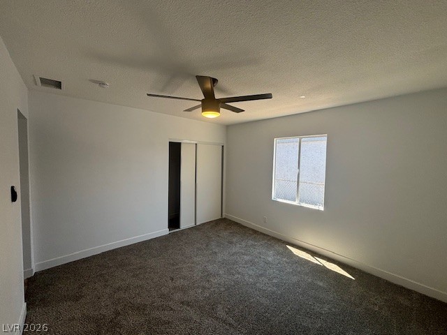 148 Fir Street Henderson, NV 89015 - Photo 8 of 12 Plush carpeting and a wide window bring warmth and natural light to this peaceful space.