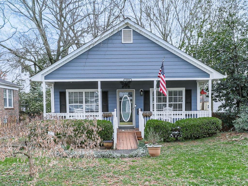1450 Athens Avenue Southwest Atlanta, GA 30310 - Photo 1 of 35 a front view of a house with garden