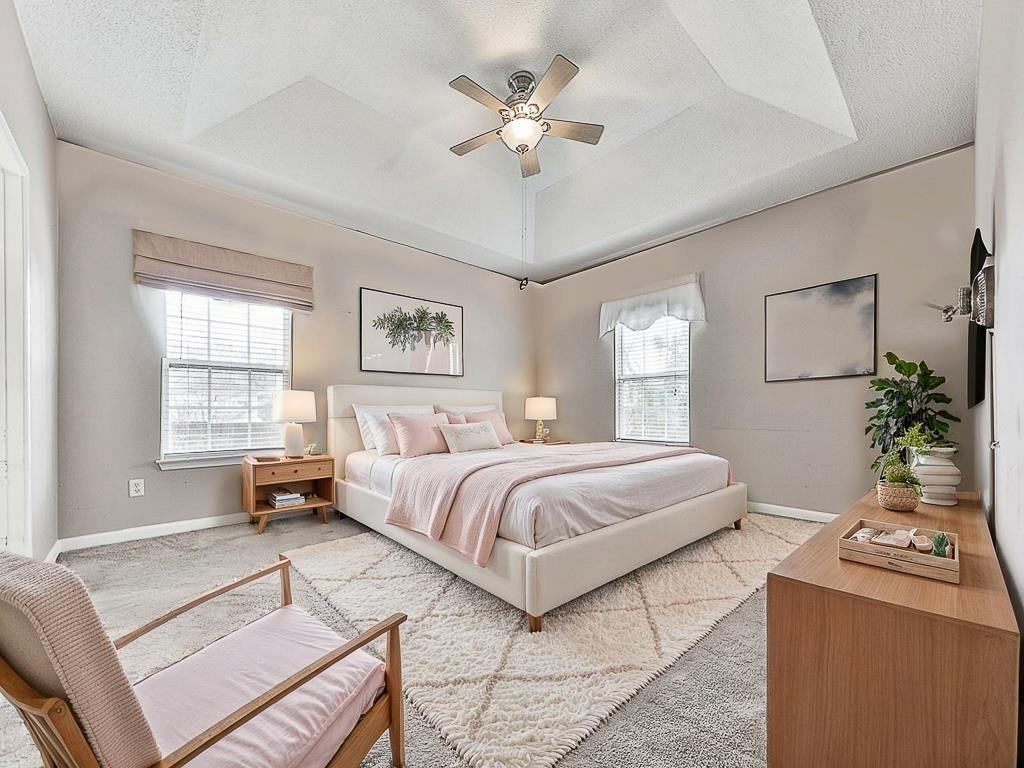 1450 Athens Avenue Southwest Atlanta, GA 30310 - Photo 19 of 35 a bedroom with a large bed and a chandelier