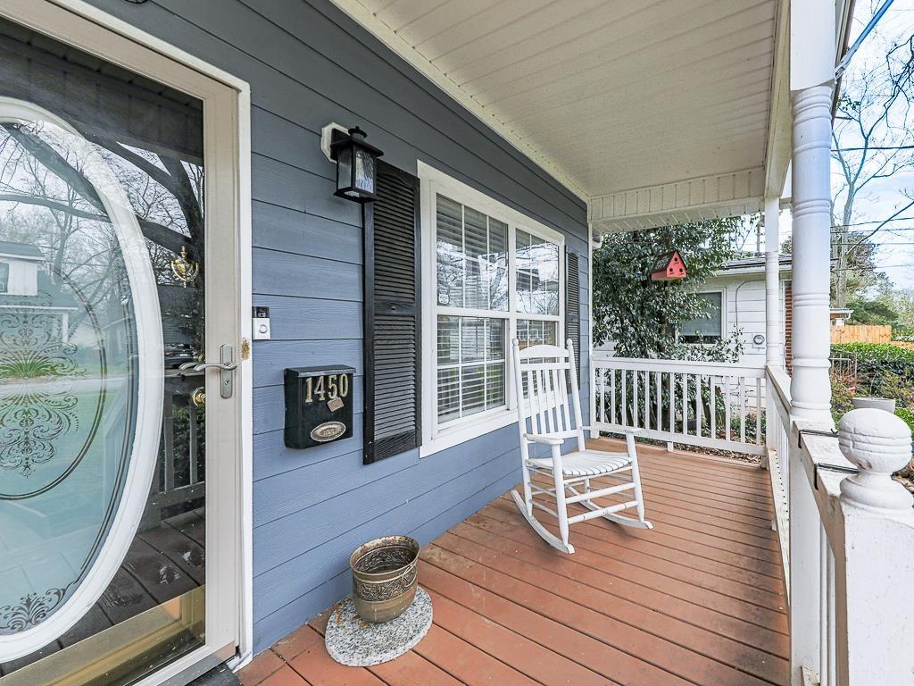 1450 Athens Avenue Southwest Atlanta, GA 30310 - Photo 2 of 35 a balcony with wooden floor table and chairs