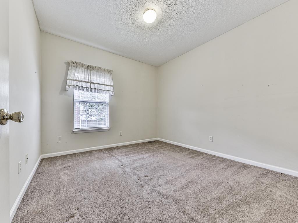 1450 Athens Avenue Southwest Atlanta, GA 30310 - Photo 26 of 35 an empty room with windows