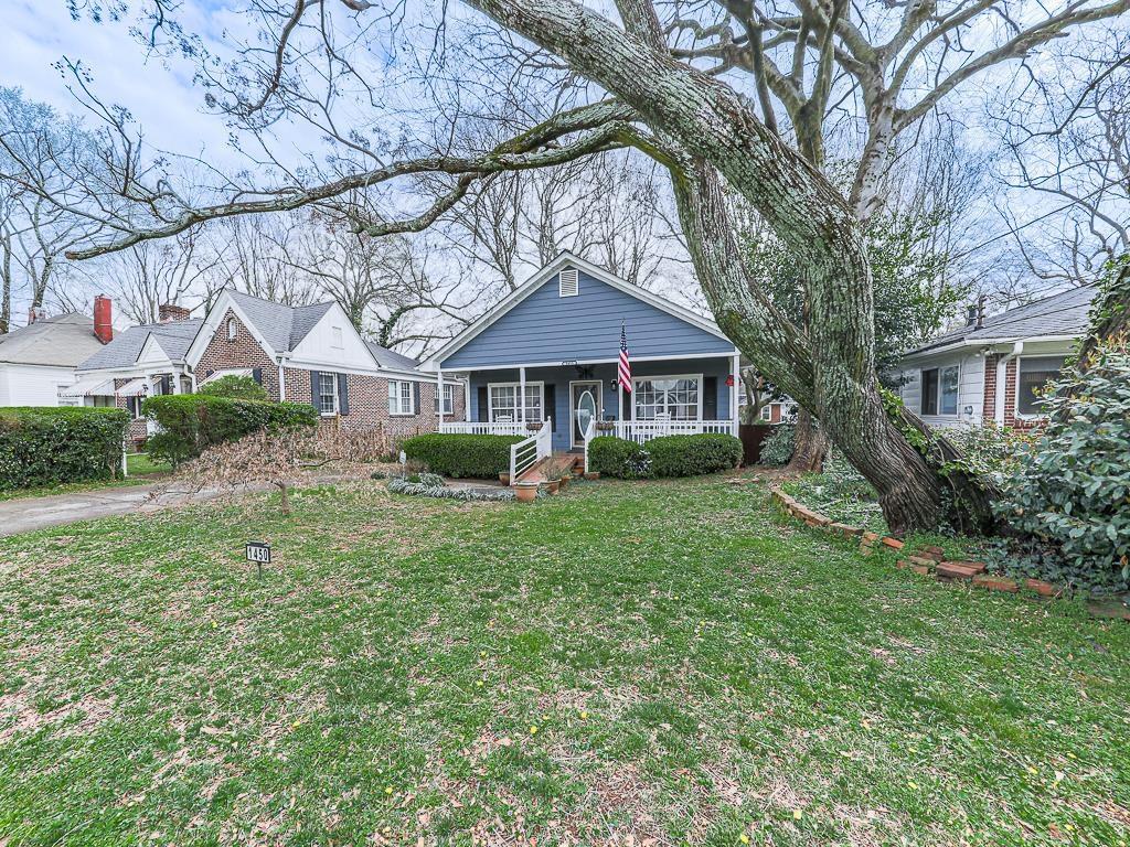 1450 Athens Avenue Southwest Atlanta, GA 30310 - Photo 28 of 35 a front view of a house with a yard