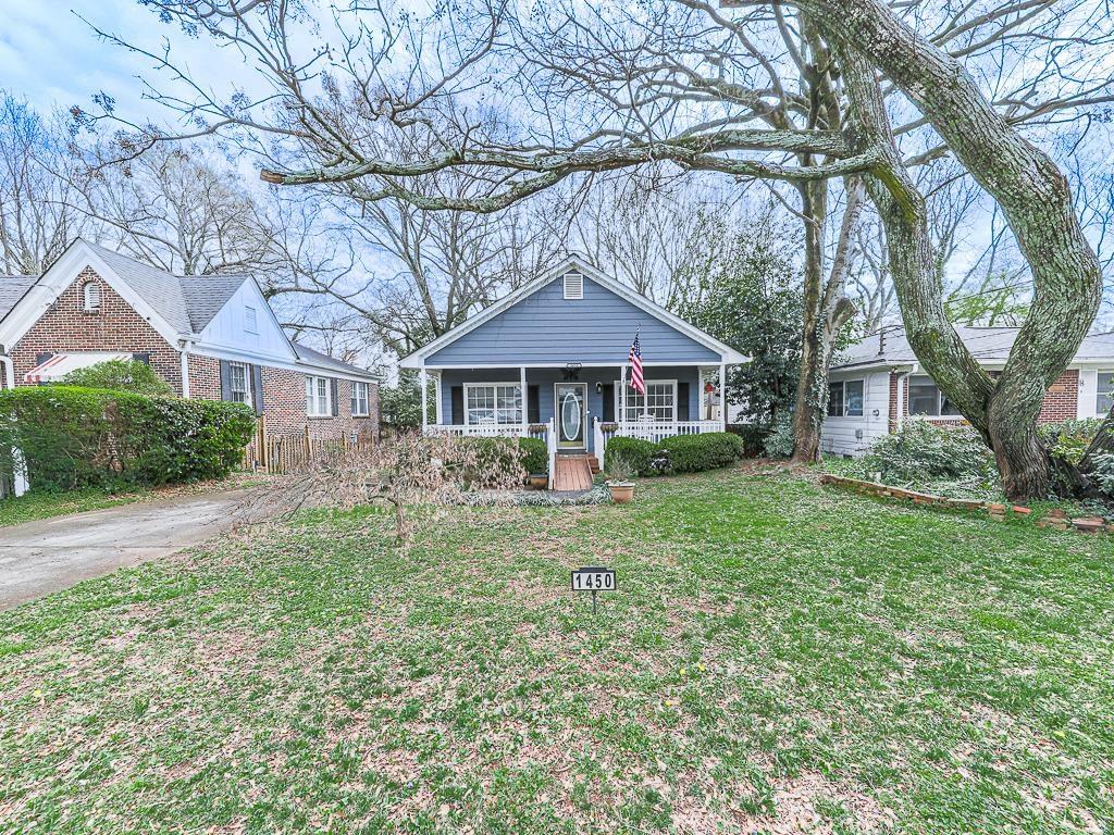 1450 Athens Avenue Southwest Atlanta, GA 30310 - Photo 29 of 35 a front view of a house with garden