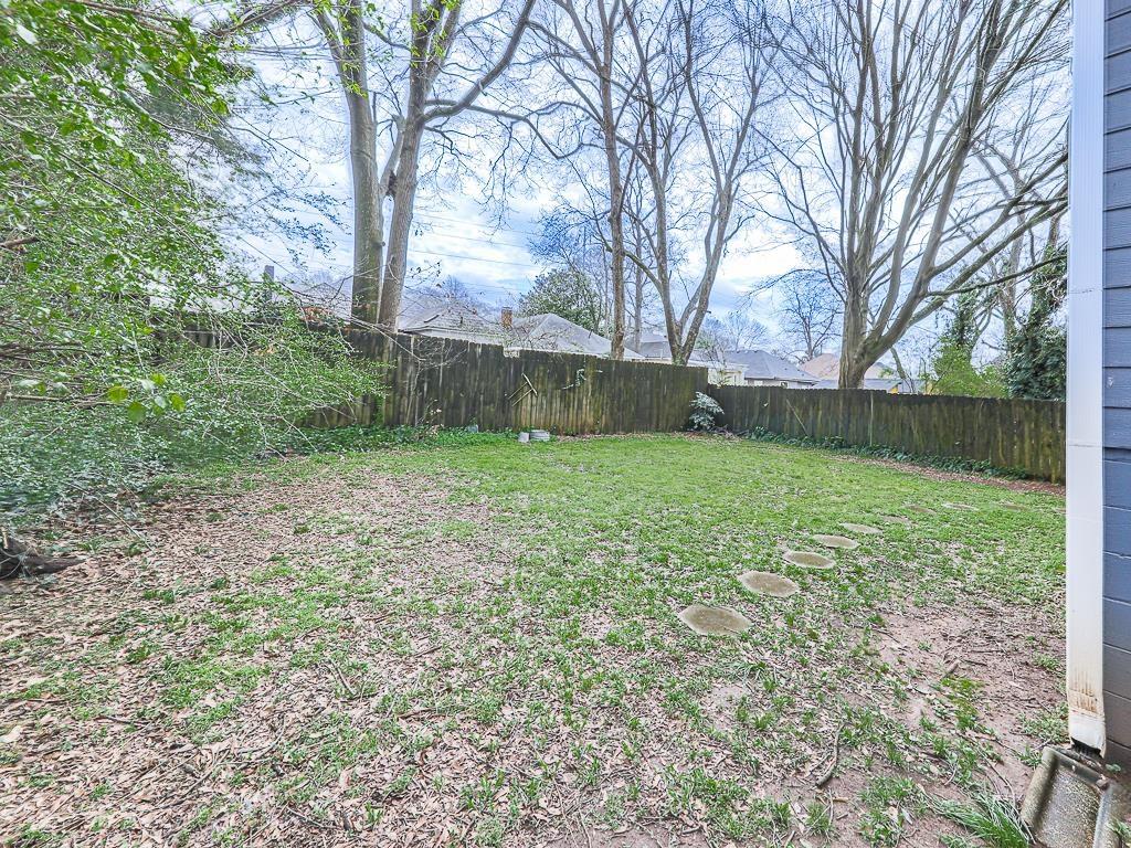 1450 Athens Avenue Southwest Atlanta, GA 30310 - Photo 33 of 35 a view of a backyard with a large tree