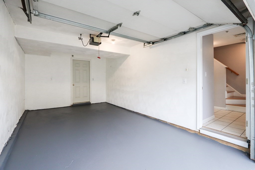 995 Trapelo Road, Unit 5 Waltham, MA 02452 - Photo 28 of 32 a view of a room with an entryway