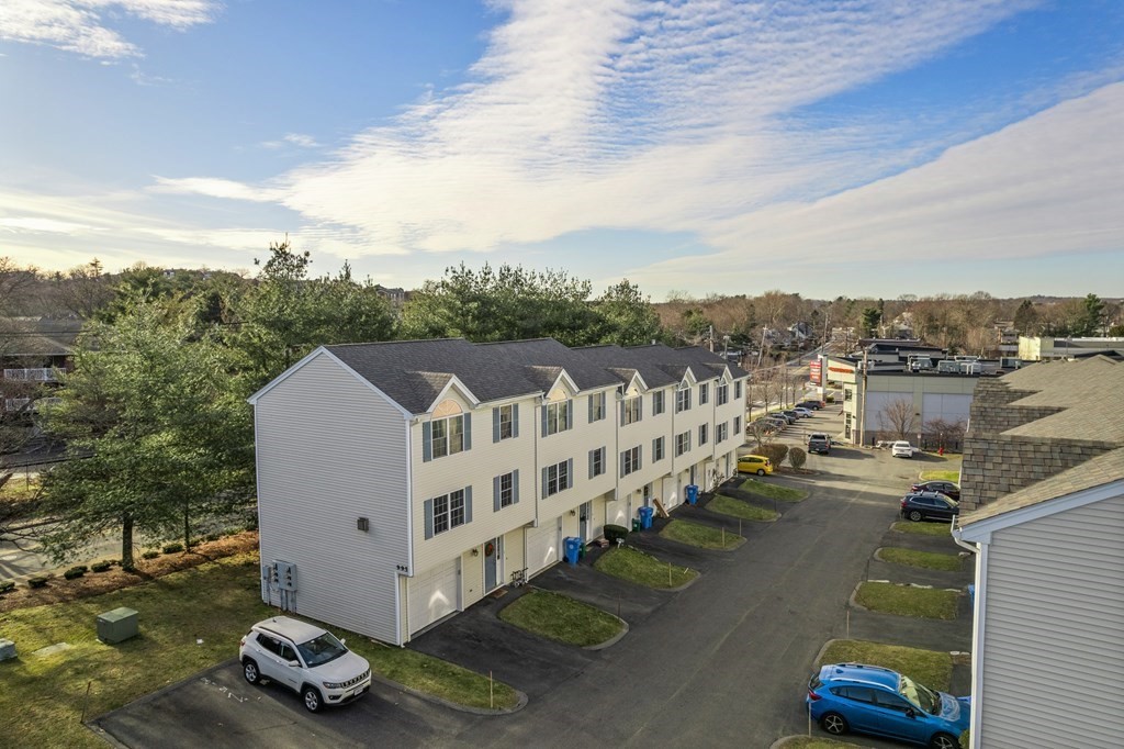 995 Trapelo Road, Unit 5 Waltham, MA 02452 - Photo 4 of 32 a view of a city from a terrace