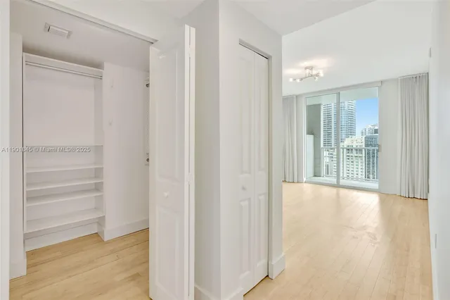 a view of an empty room and window