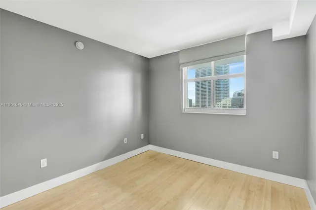 a view of a room with a window