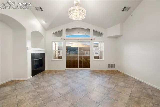 a view of a kitchen with a microwave and a sink