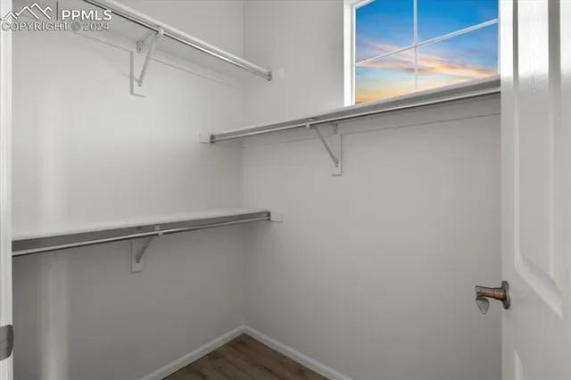 an aerial view of a house with outdoor space