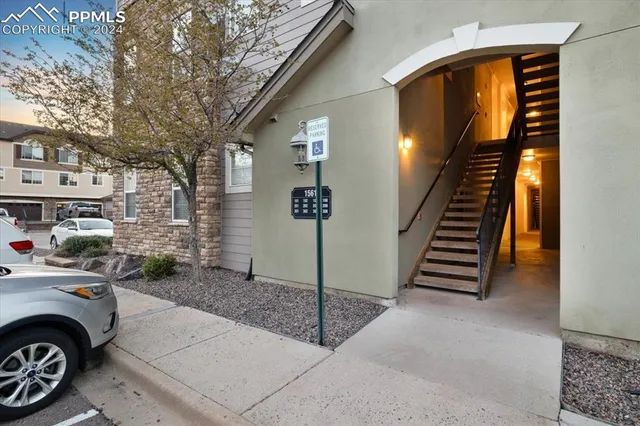 a view of a couches and a stove in the patio