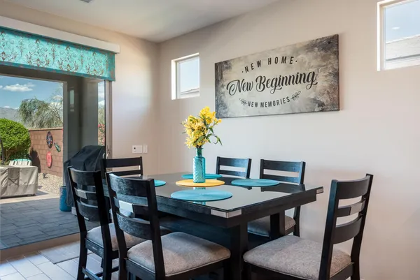 a view of a dining room with furniture