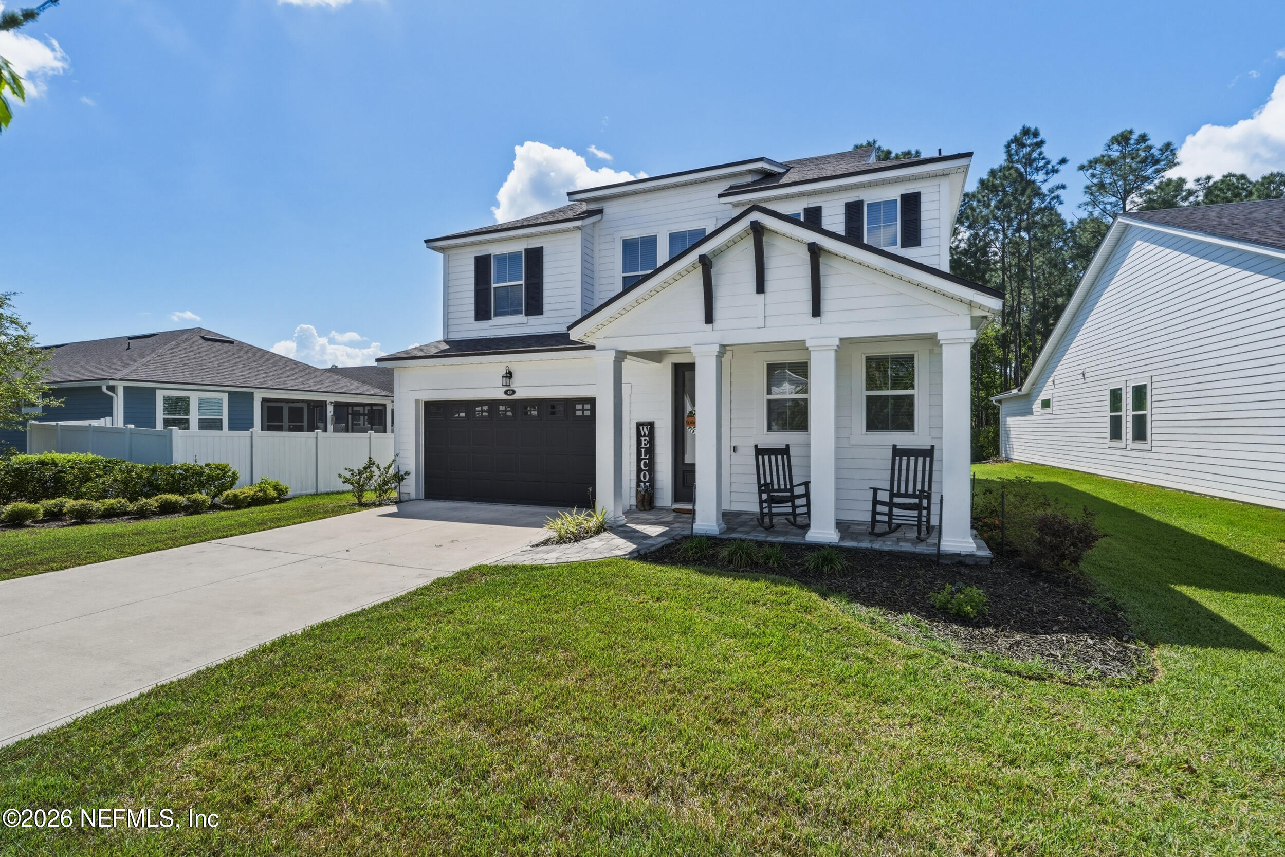49 Oak Shadow Place St. Johns, FL 32259 - Photo 12 of 48 front view of a house with a yard
