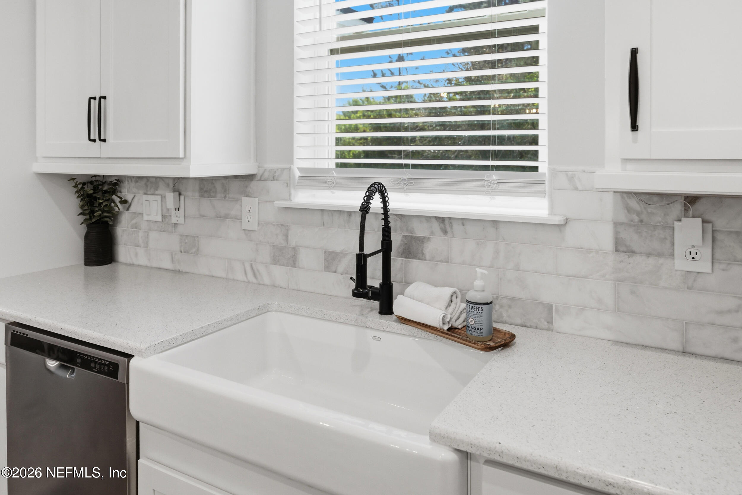 49 Oak Shadow Place St. Johns, FL 32259 - Photo 16 of 48 a bathroom with a sink and a window