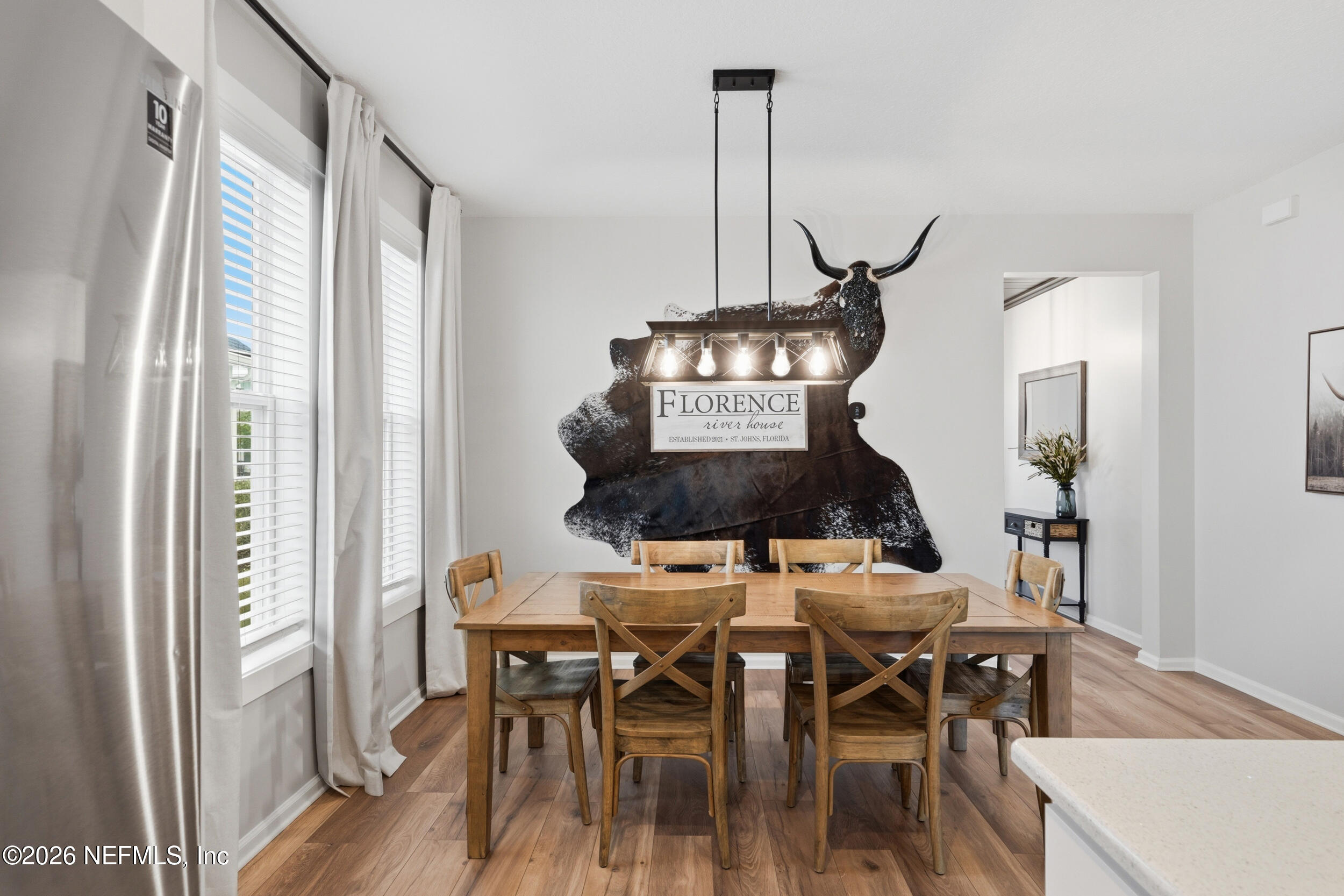 49 Oak Shadow Place St. Johns, FL 32259 - Photo 20 of 48 a view of a dining table chairs and chandelier
