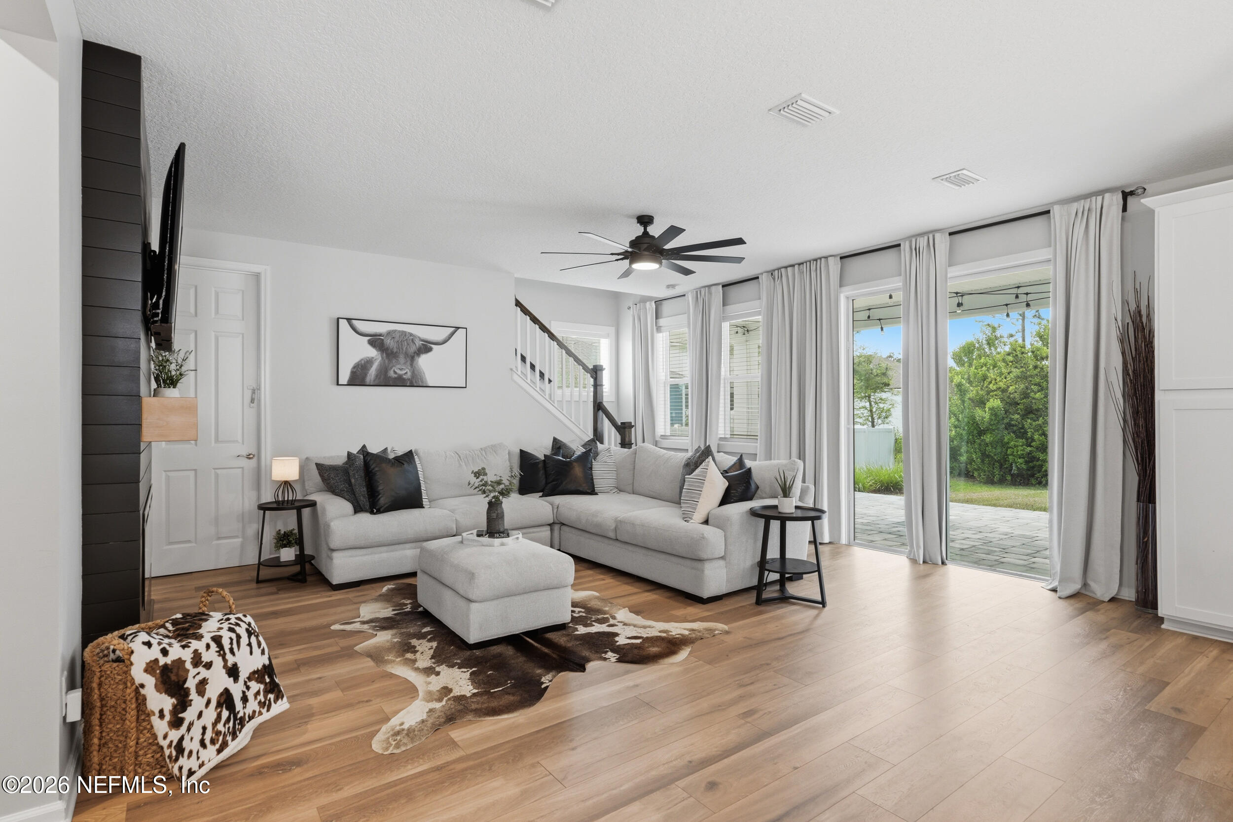 49 Oak Shadow Place St. Johns, FL 32259 - Photo 22 of 48 a living room with furniture and a large window