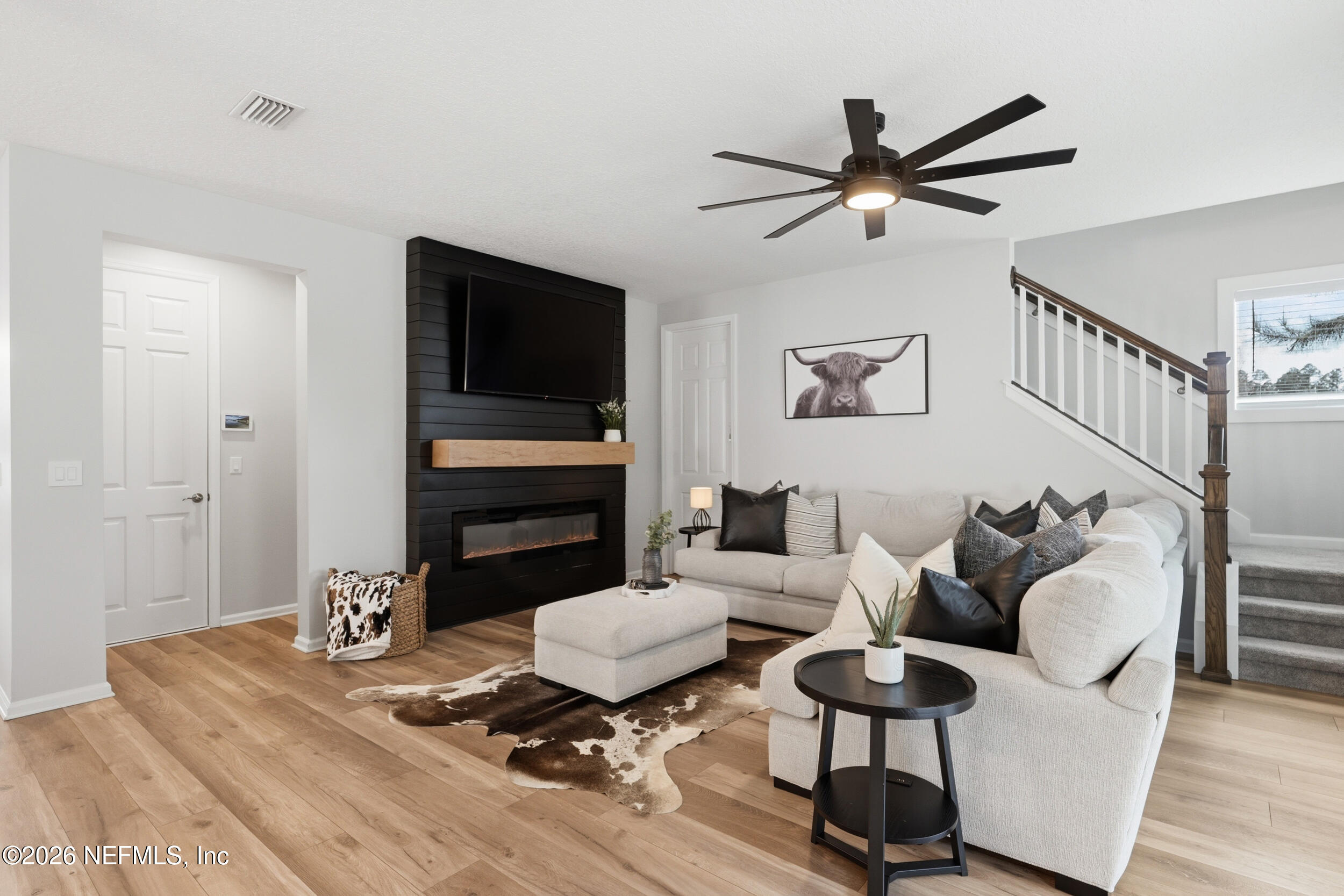 49 Oak Shadow Place St. Johns, FL 32259 - Photo 23 of 48 a living room with furniture and a flat screen tv