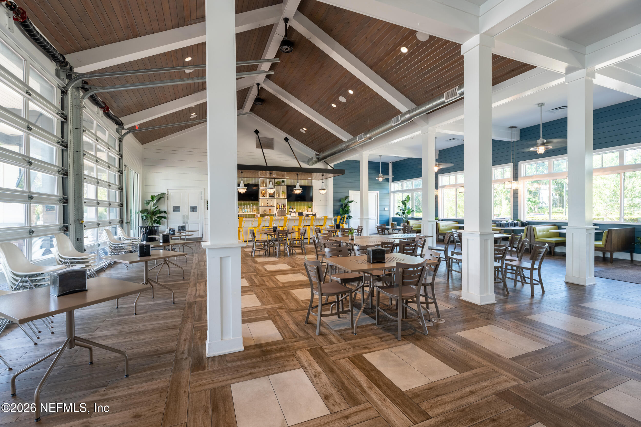 49 Oak Shadow Place St. Johns, FL 32259 - Photo 46 of 48 a view of a dining hall with lots of furniture and wooden floor